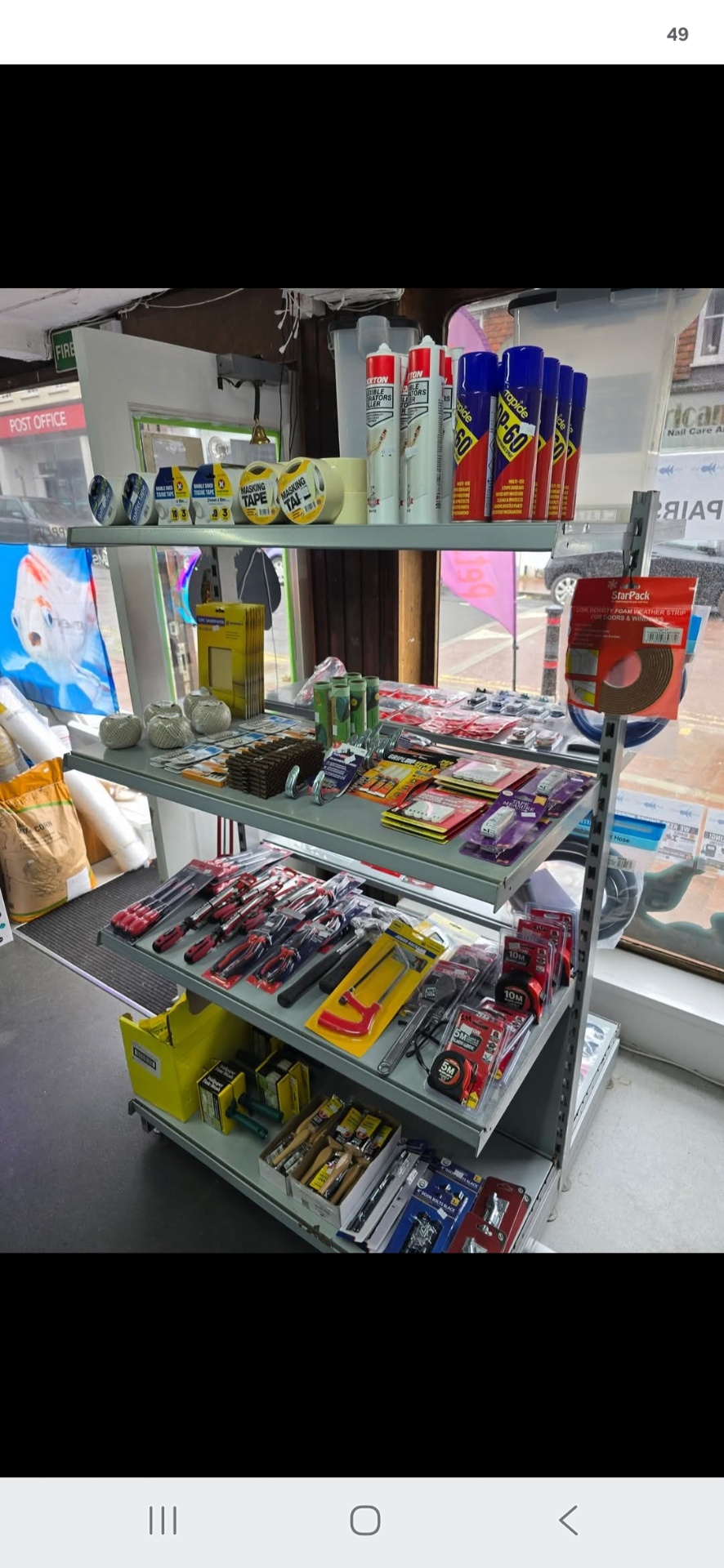 Inside Hailsham Hardware — real shelves with tools, tape and DIY essentials